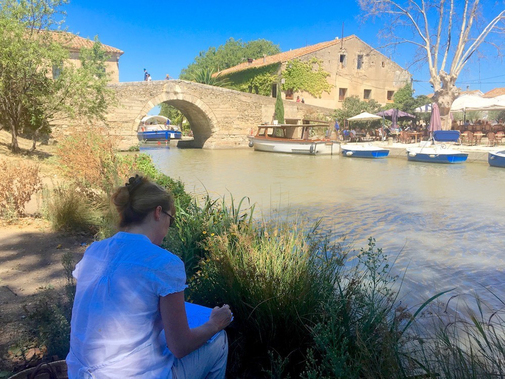Annette sketching at Le Somail